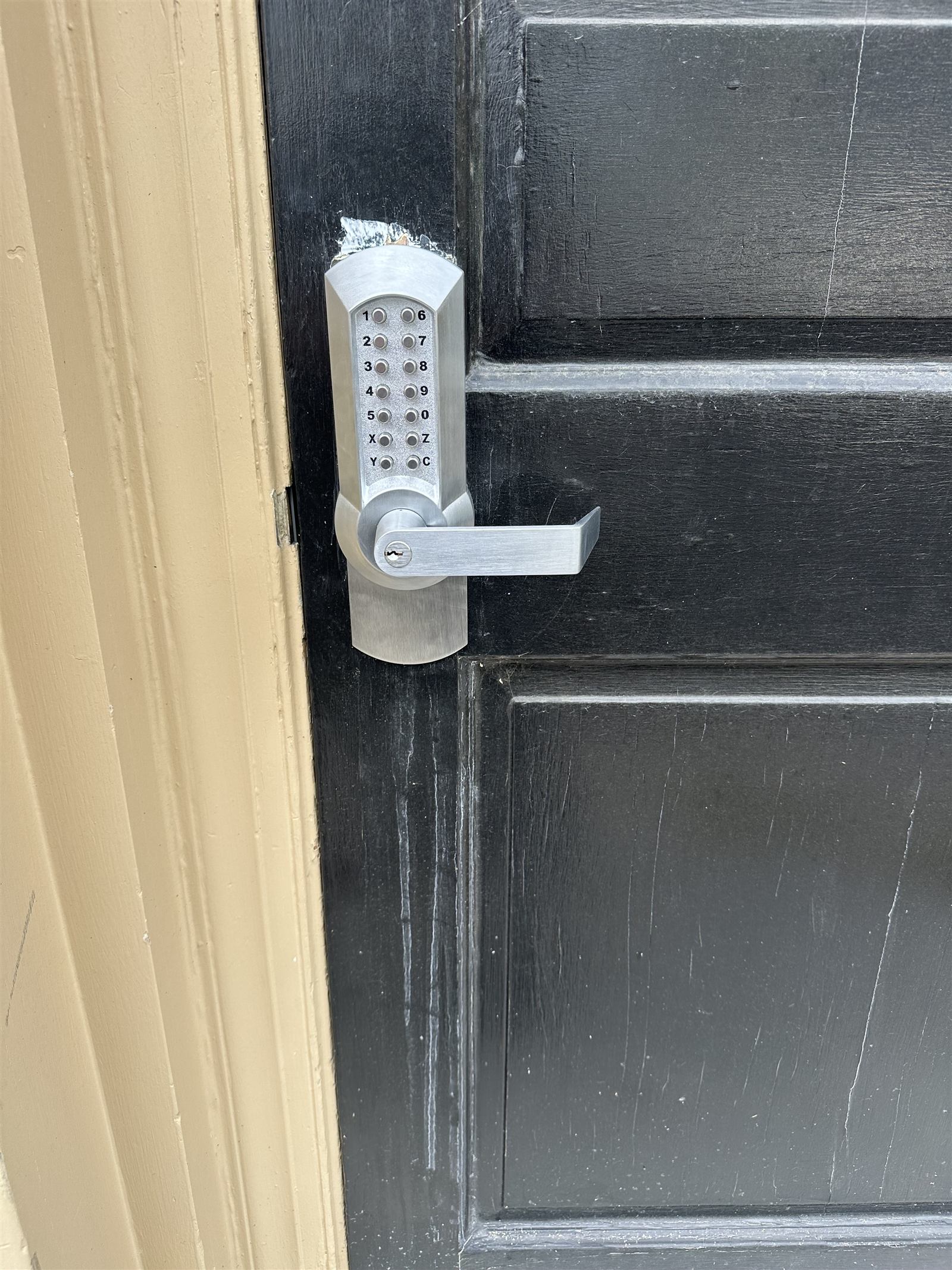 Keyless entry keypad lock installed on a commercial door in Winchester VA