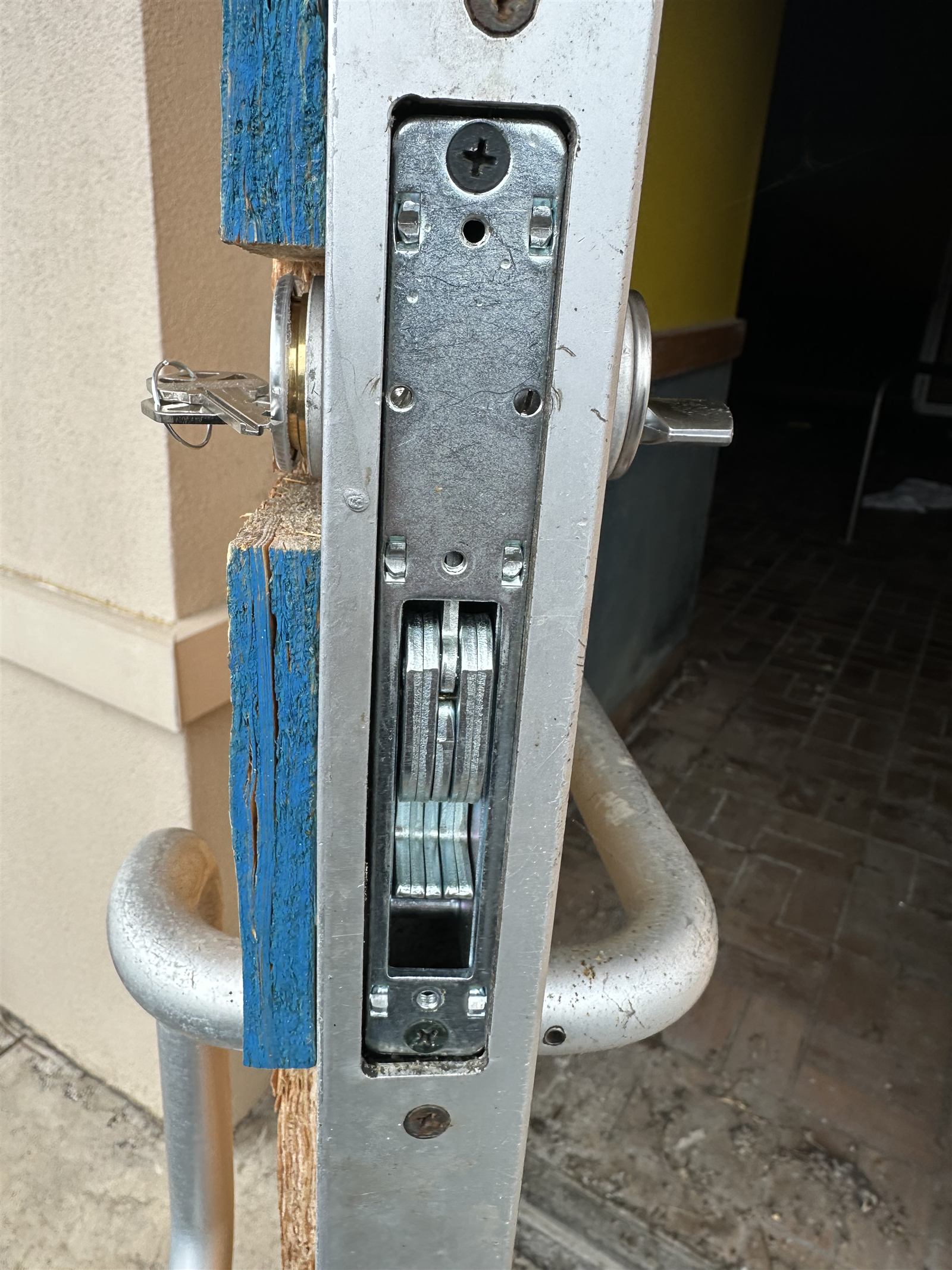 Commercial mortise lock cylinder replacement on a storefront door in Winchester VA