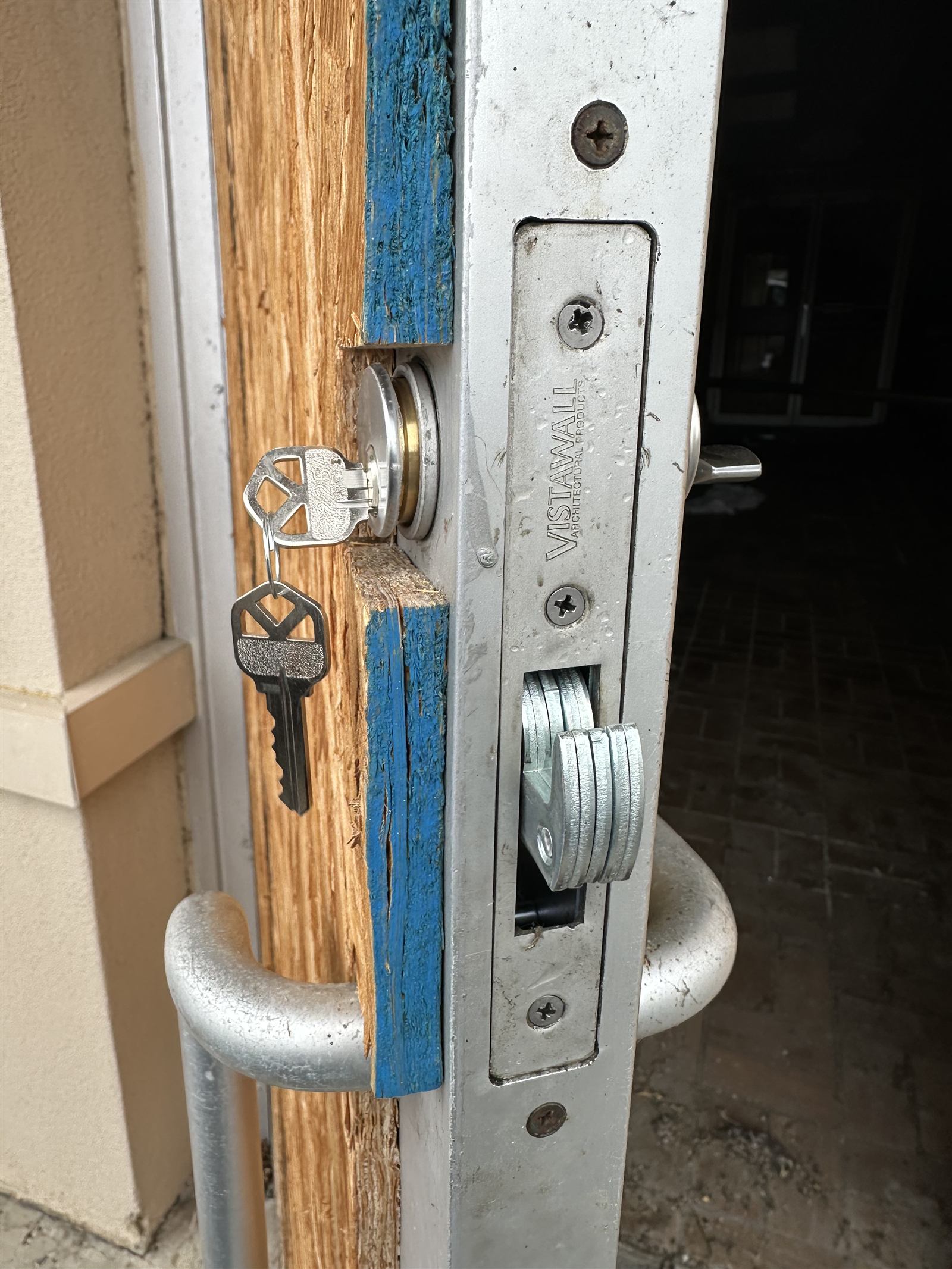 Storefront door lock rekeyed with new keys in Winchester VA